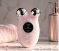 EMS Microcurrent Facial Lifting Device — bathroom lifestyle shot with skincare