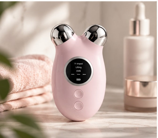 EMS Microcurrent Facial Lifting Device with serum bottle — skincare routine