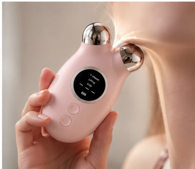 Hand holding EMS Microcurrent Facial Lifting Device — in-use demonstration