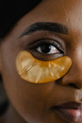 BIOAQUA Gold Collagen Eye Patches applied under eyes — gold peptide treatment